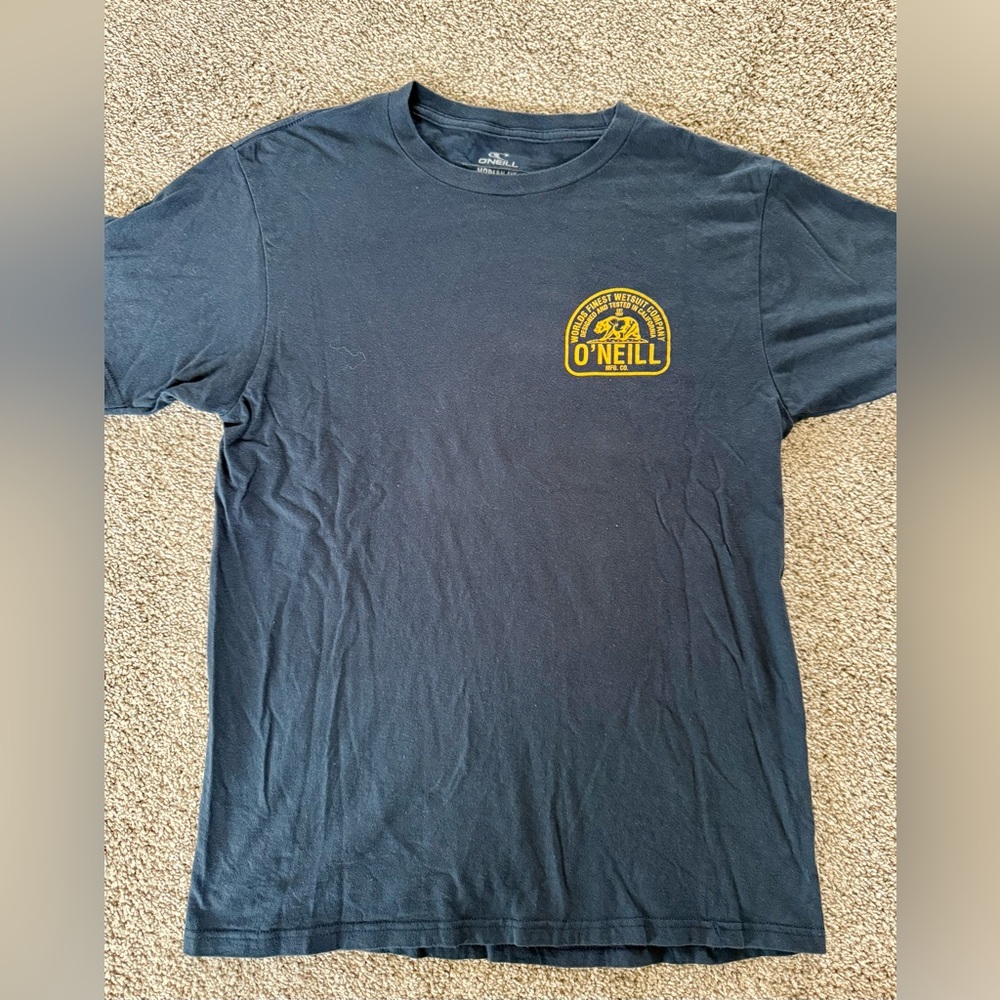 O'Neill navy blue T-shirt with gold graphics and lettering size Medium